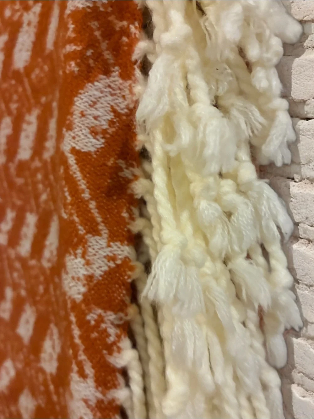 Threshold soft woven throw with knotted tassels. 60”x50”.